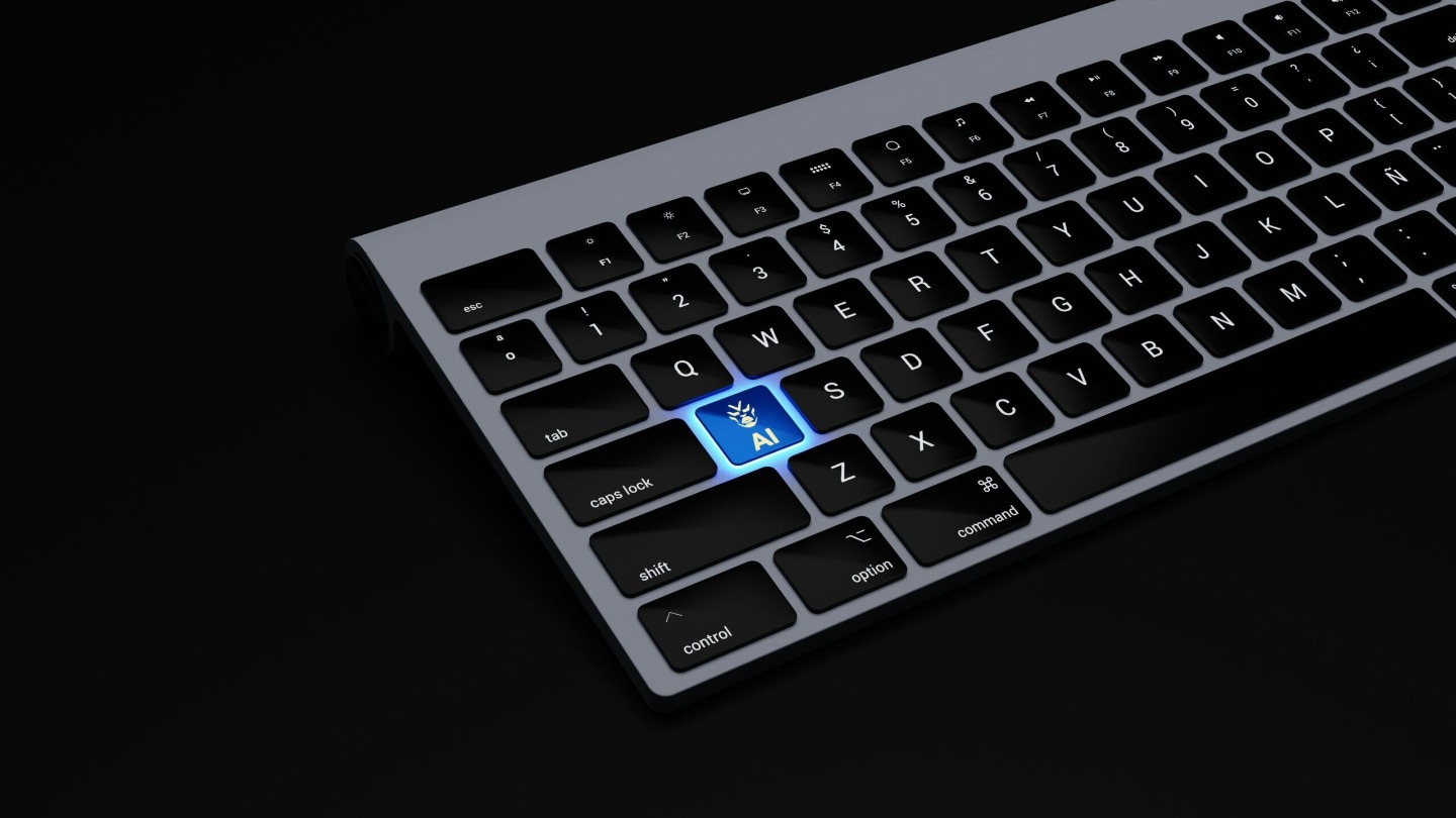 AI key lit up on computer keyboard