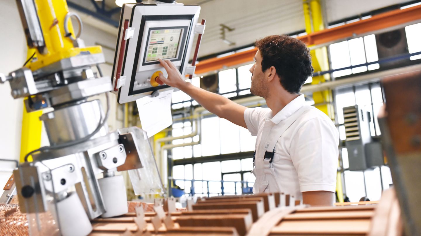 Person using a machine in the manufacturing industry