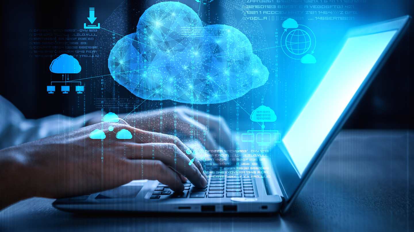 how-2020-changed-the-way-we-use-the-cloud-services-cloud-technologies Person typing on a laptop with a cloud and tech icons surrounding it