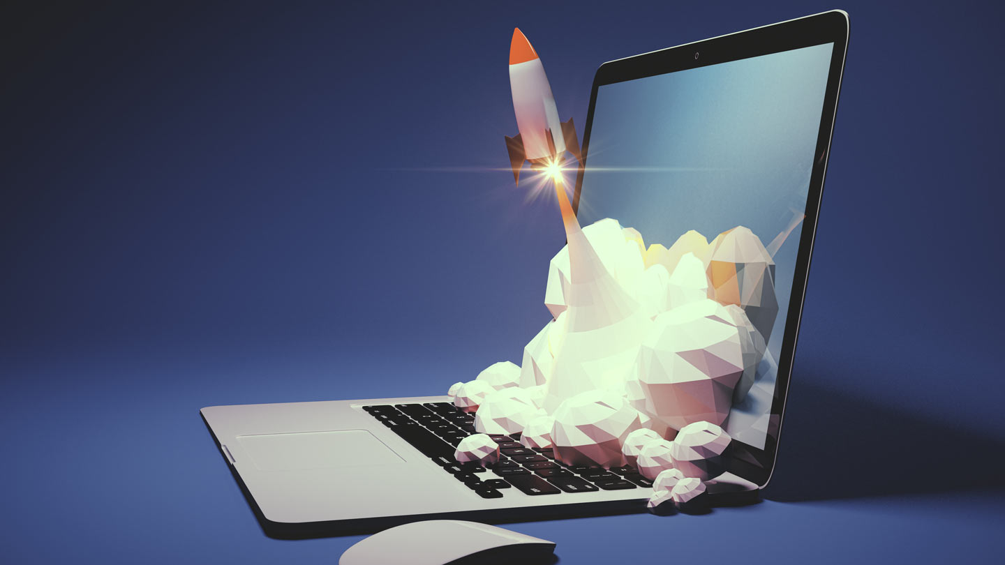 Leveraging a Minimum Viable Product to Speed Time to Market and Reduce Risk Rocket emerging from the laptop symbolising product launch