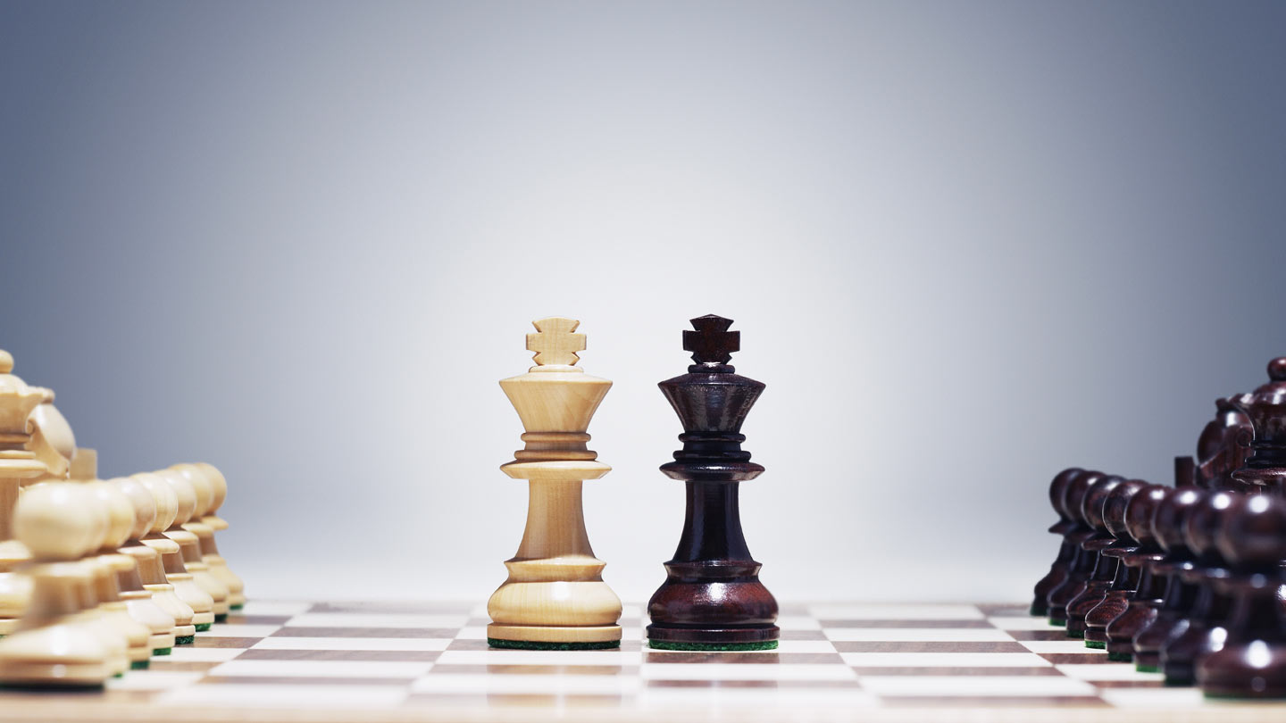 Webinar: AWS v. Microsoft Azure Chess board is set with two kings aligned in the center.